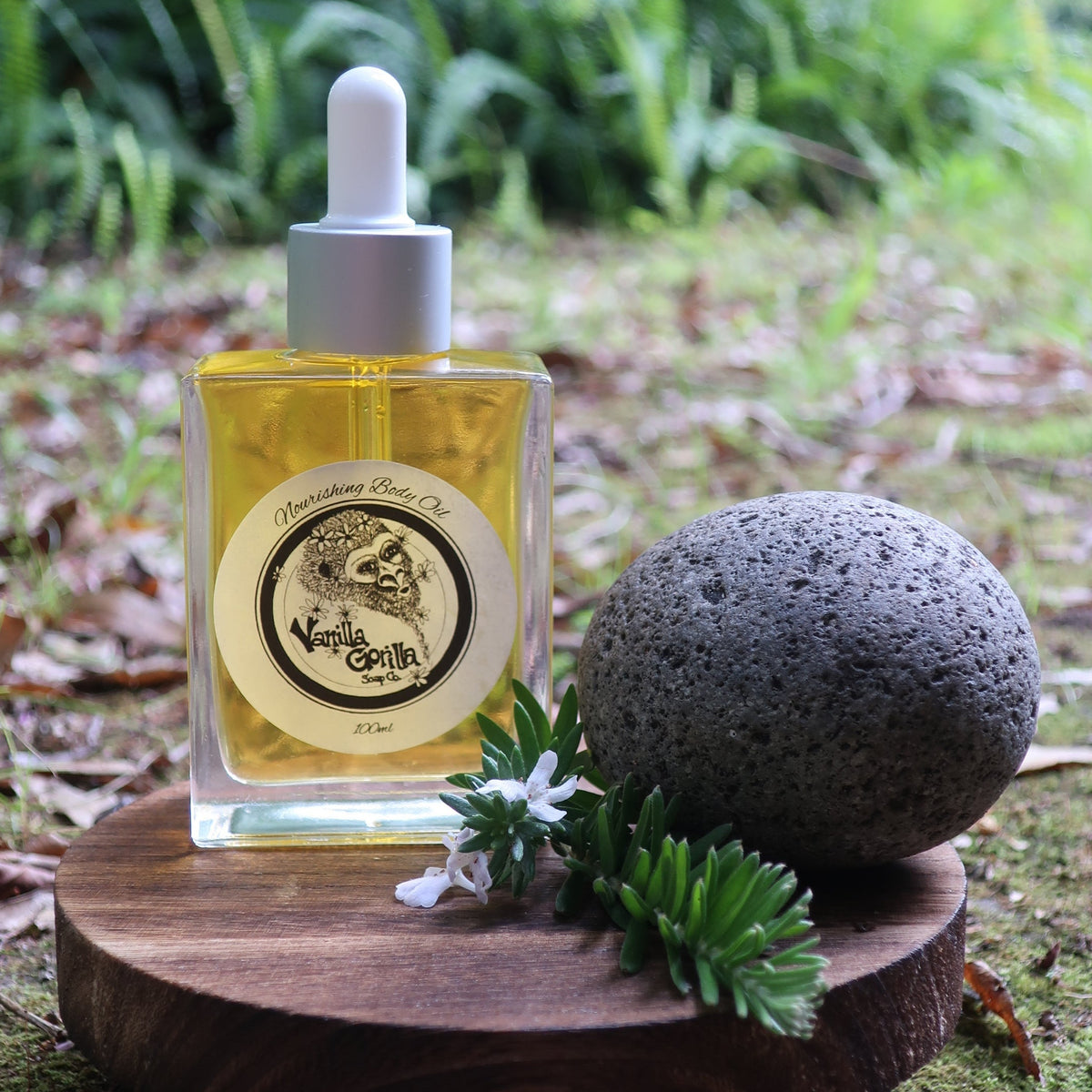 body oil with vanilla gorilla brand in natural setting