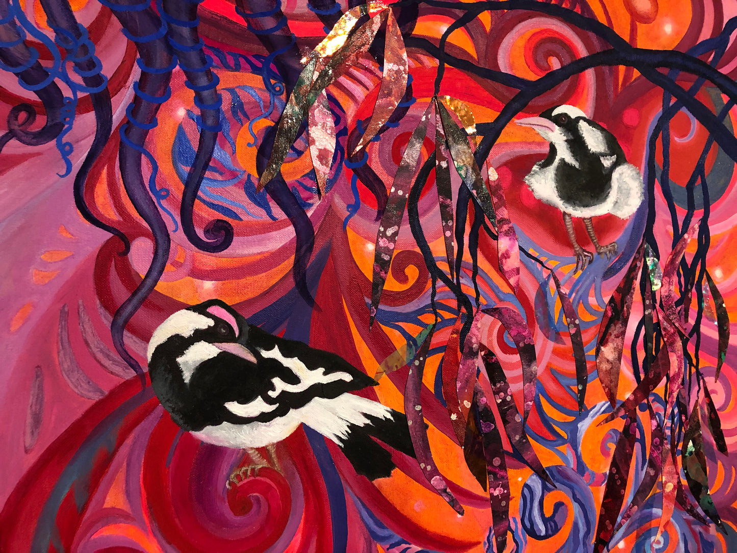 2 magpie larks or peewee's on a bright psychedelic background
