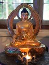 Medicine Buddha statue in gold