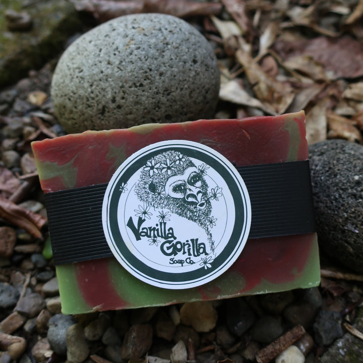 Bar of candy apple soap with a label on a natural background