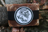 caramel swirl Bar of soap with a 'Vanilla Gorilla Soap Co.' label on a natural background