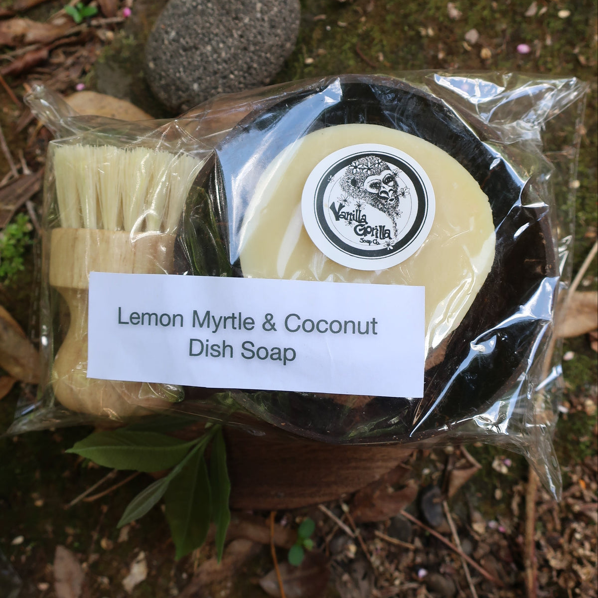 Packaged dish soap with a label on a natural background