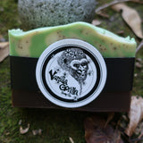 Bar of lime splice, vanilla gorilla soap with a label on a natural background
