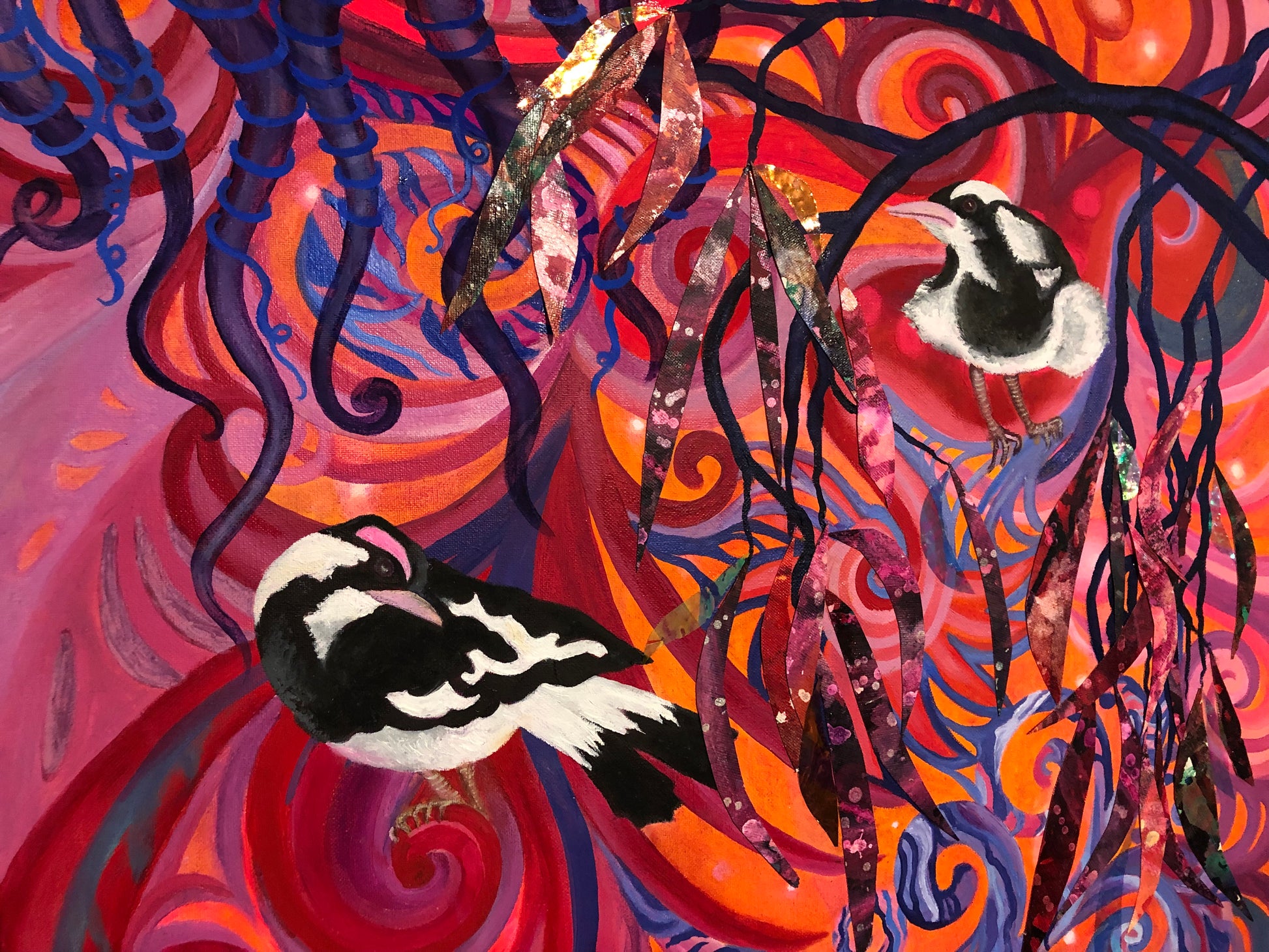 2 magpie larks or peewee's on a bright psychedelic background
