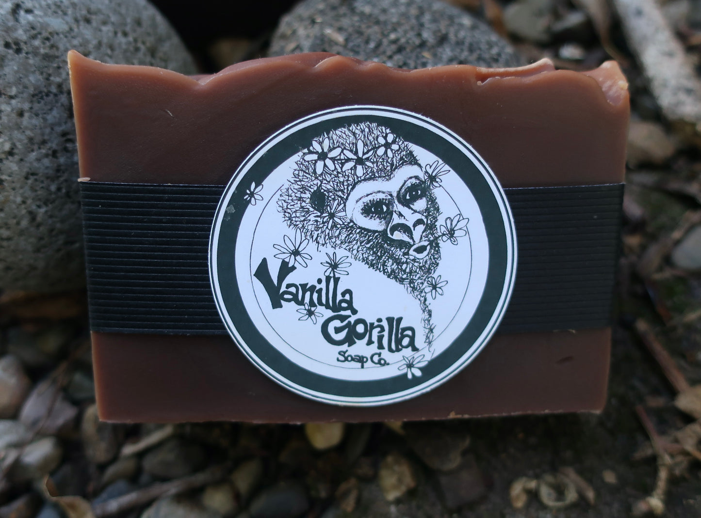 Bar of soap with a 'Vanilla Gorilla Soap Co.' label on a natural background