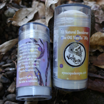 Two The OG Vanilla Gorilla deodorant sticks on a natural background with leaves and rocks.