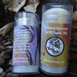 Two deodorant sticks with visible labels on a natural background