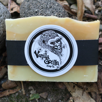 Bar of lemon myrtle soap with a vanilla gorilla label on a natural background